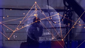 Man raising smartphone to ear and calling in garage, activating pulsing network globe overlay. Technology, communication, networking, digital, industrial, futuristic, innovation - Powered by Shutterstock - Get 15% off with code: PIKWIZARD15