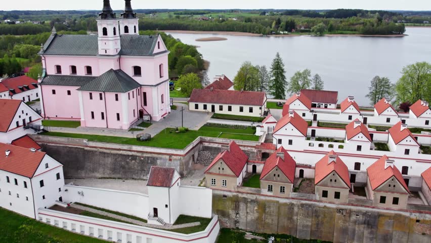 Monastery building on an island in the middle of a lake. Drone footage. Suwalki, Poland