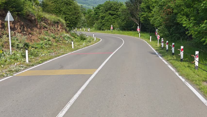Six different views of a winding mountain road featuring tire skid marks