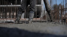 Concrete pouring on reinforced foundation at construction site - Powered by Shutterstock - Get 15% off with code: PIKWIZARD15