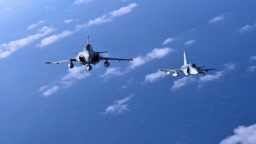 Rafale fighter jets and Saab JAS 39 Gripen flying together