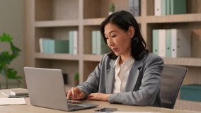 Asian Chinese businesswoman talk video call laptop conference online meeting computer distant chat internet education course female Korean Japanese business woman girl working consultation in office - Powered by Shutterstock - Get 15% off with code: PIKWIZARD15