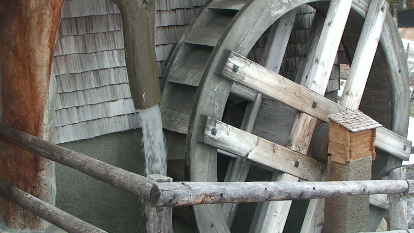 Old mill with running water pipe