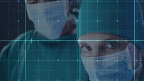 Masked surgeons undergoing biometric scan as cyan grid overlay sweeping in scanning faces for ID. Medical, healthcare, technology, innovation, professionalism, diagnostics, future - Powered by Shutterstock - Get 15% off with code: PIKWIZARD15