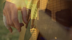Musician's hand plucking guitar strings for music scene revealing transparent cityscape at sunset. Instrument, silhouette, contemporary, artistic, urban, ambient, melodic - Powered by Shutterstock - Get 15% off with code: PIKWIZARD15