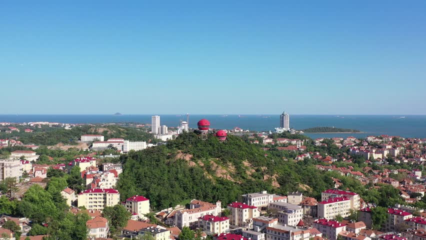 Exploring qingdao old town from signal hill park a sunny day view of china