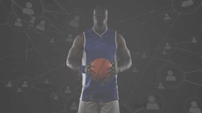 athlete holding basketball activating digital network behind him showing technology connectivity. Sports, connectivity, digital, network, innovation, technology, performance - Powered by Shutterstock - Get 15% off with code: PIKWIZARD15