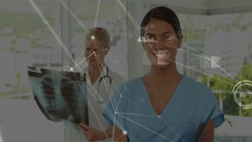 Nurse writing notes initiating medical data overlay diagnosing X-ray regions branching to MD. Medical, diagnostic, digital, healthcare, clinical, innovative, collaboration - Powered by Shutterstock - Get 15% off with code: PIKWIZARD15