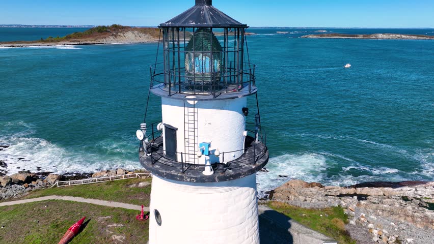 Boston Lighthouse on Little Brewster Island in Boston Harbor, Boston, Massachusetts MA, USA.