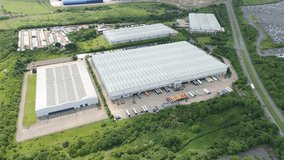 Sunny Day Aerial View of Data Centre and Warehouse District in Corby Northamptonshire - Powered by Shutterstock - Get 15% off with code: PIKWIZARD15