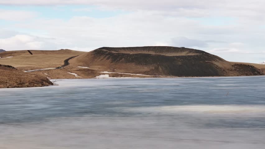 frozen lake view of volcanic pseudocrater at Mývatn near Skútustaðir village in Reykjahlíð area