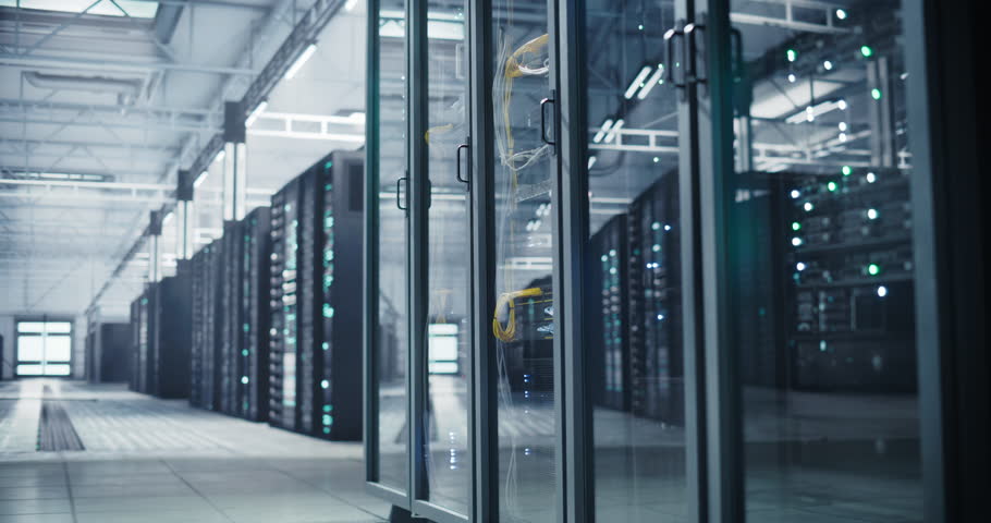 Data Center Storage Facility with Server Cabinets. Automated Supercomputer Cluster Built for Training Artificial Intelligence Large Language Models and Compute Data. No People on Sight