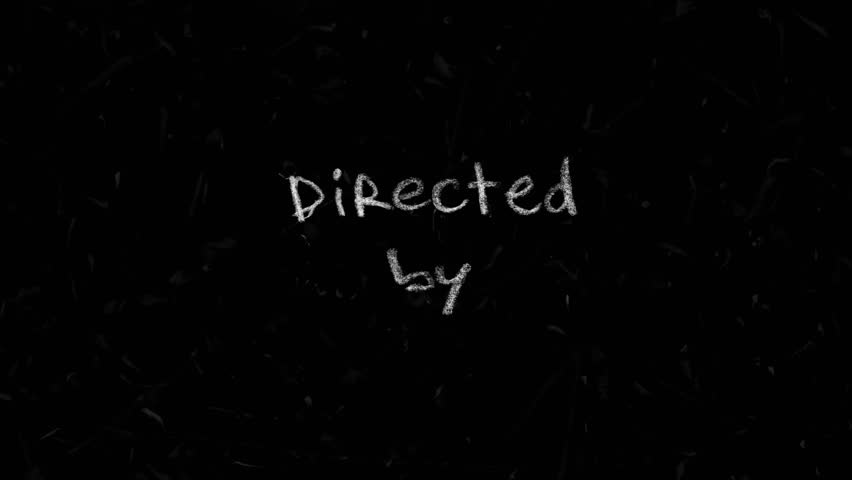 Directed by movie title handwritten in white crayon on black paper, horizontal stopmotion film credits