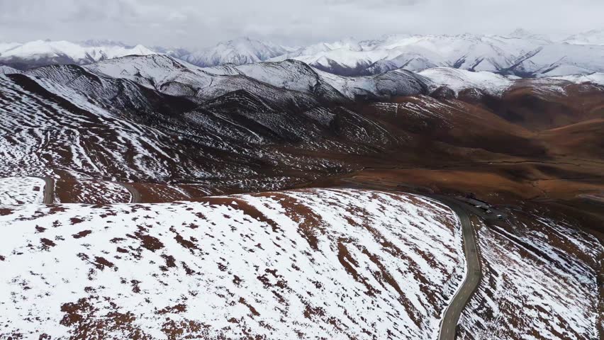 Aerial fly curved roads in Mountain Top landscape to Mount Everest, Himalayan peaks, wild pathway