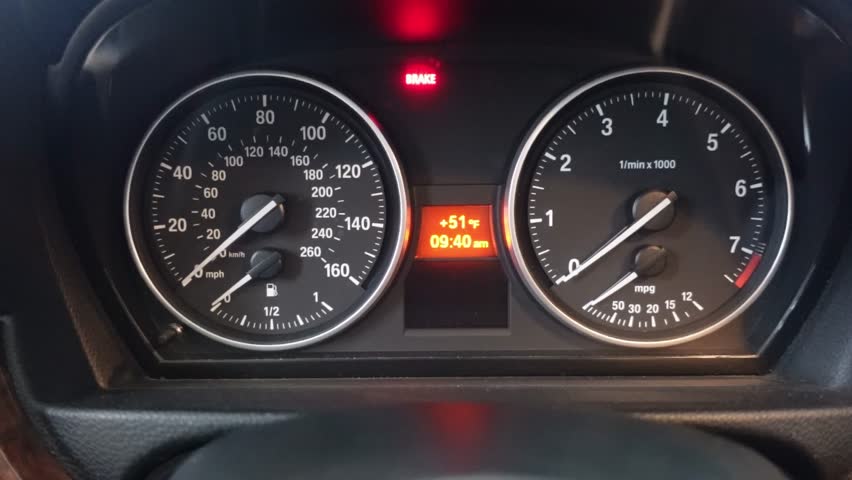 Illuminated Car Dashboard with Warning Lights