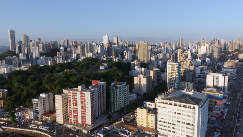 Aerial view of Barra neighbourhood with the historic Farol da Barra, the oldest lighthouse in operation on the coast of the Americas, at sunset in Salvador, Bahia, Brazil. 