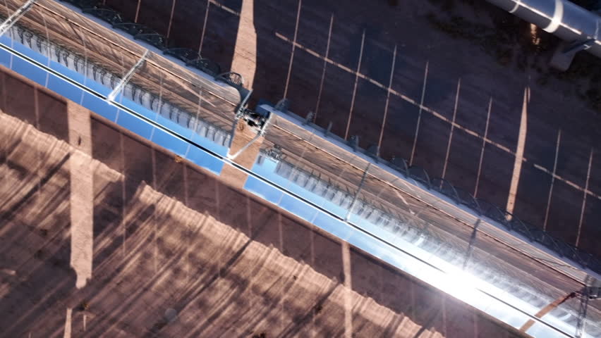 "A close-up view of solar panels at the Noor Solar Energy Complex in Morocco, showcasing advanced technology converting intense sunlight into sustainable and eco-friendly electricity."