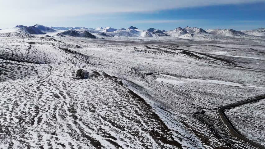Aerial fly snowy landscape in a secluded road to mount Everest, Himalayan landscape