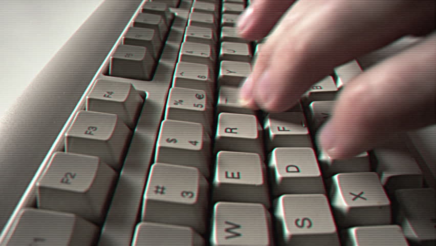 Computer engineer developer is working on old vintage computer 1990s. Antique classic pc keyboard and programmer typing hands. Internet web digital startup history. Outdated retro technology concept