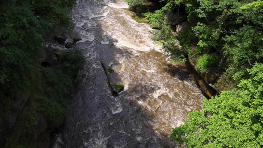 Whitewater rapids rush through the rocky gorge of the Cuyahoga River at High Bridge Glens in Summit County, Ohio — a restored natural escape near Akron and Cuyahoga Falls.