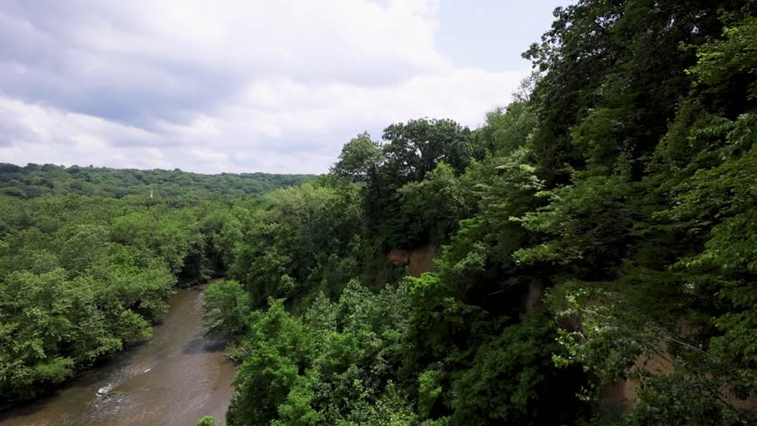Whitewater rapids rush through the rocky gorge of the Cuyahoga River at High Bridge Glens in Summit County, Ohio — a restored natural escape near Akron and Cuyahoga Falls.
