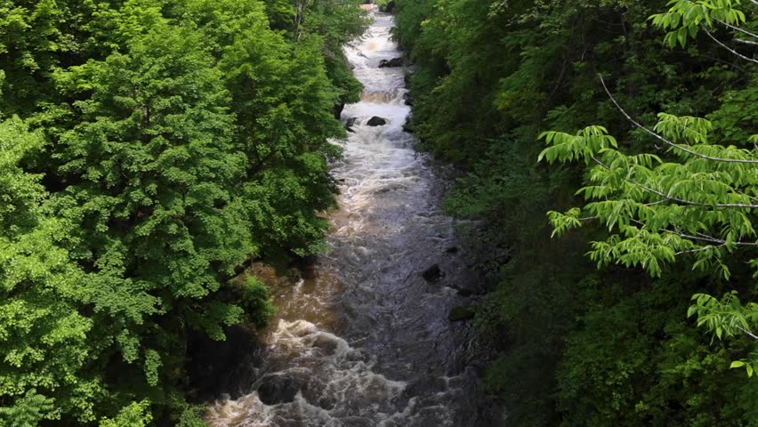 Whitewater rapids rush through the rocky gorge of the Cuyahoga River at High Bridge Glens in Summit County, Ohio — a restored natural escape near Akron and Cuyahoga Falls.
