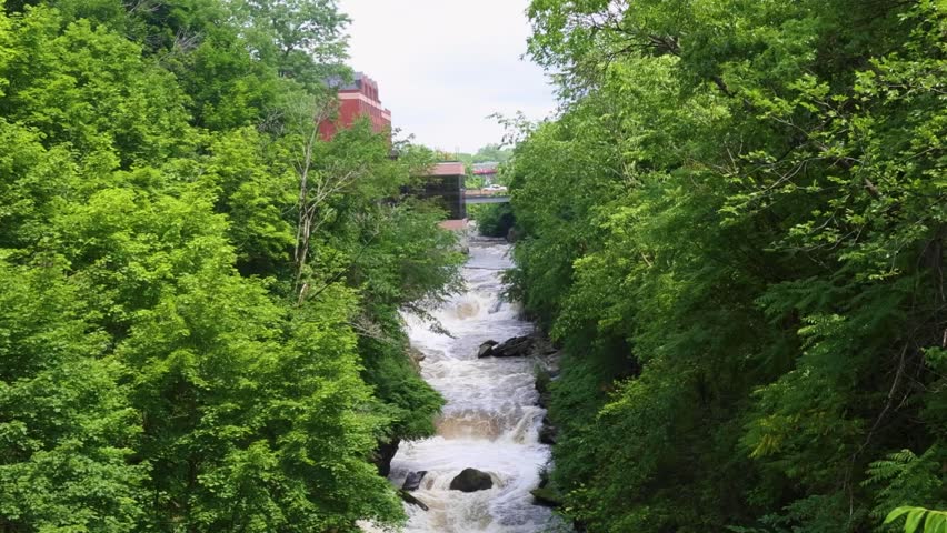 Whitewater rapids rush through the rocky gorge of the Cuyahoga River at High Bridge Glens in Summit County, Ohio — a restored natural escape near Akron and Cuyahoga Falls.