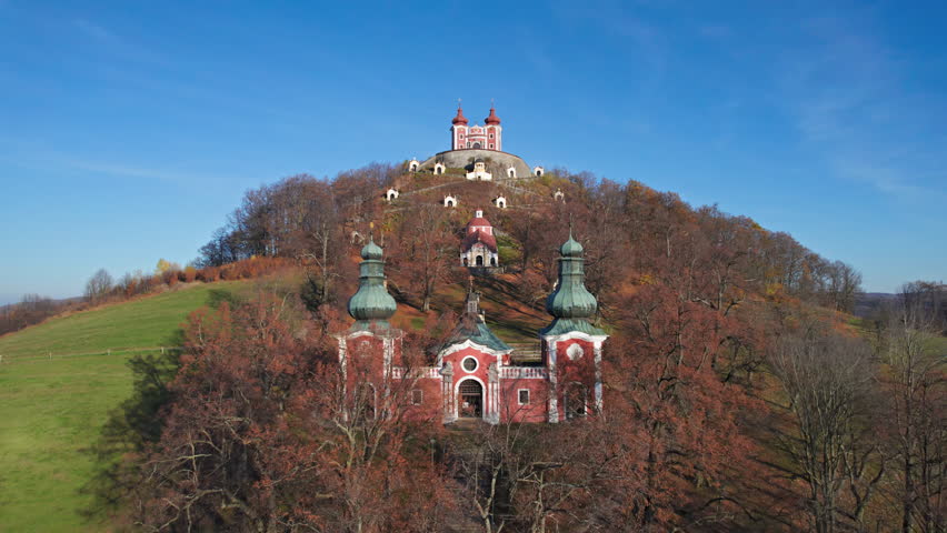 Flying over of the Calvary of Banska Stiavnica, Slovakia, a complex of churches and chapels on Scharfenberg Hill.