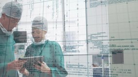 Male surgeon tapping tablet stylus and female surgeon scrolling patient data with grid overlay. Medical, teamwork, collaboration, professionalism, high-tech, clinical, contemporary - Powered by Shutterstock - Get 15% off with code: PIKWIZARD15