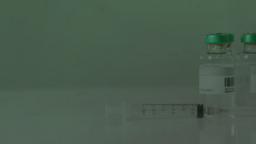 Vaccine vials and syringe sliding from right while chalk icons orbiting, highlighting lung health. Medical, health, immunization, prevention, science, education, awareness