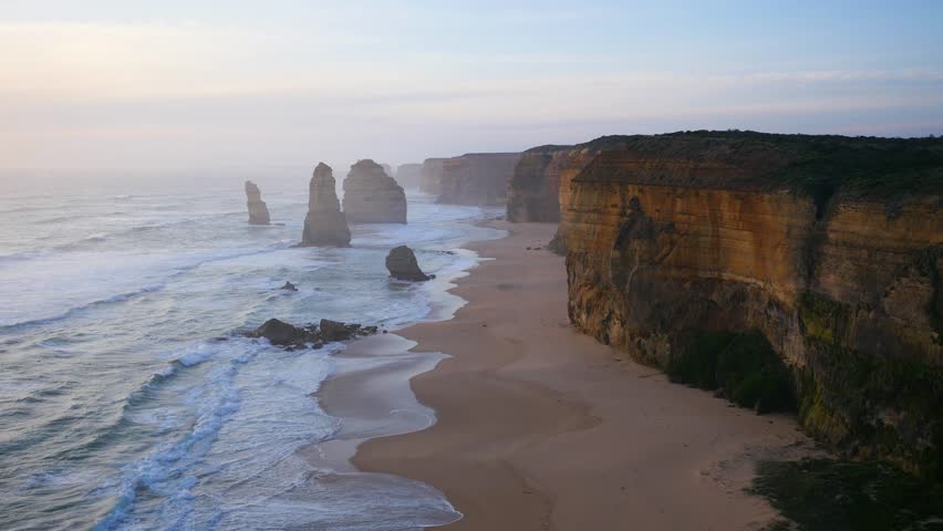 twelve apostles rock formation in australia overlaid with animated graphic spelling out australia stock video