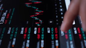 Close-up Person Analyzing Stock Market Graph on Digital Tablet Touch Screen. Businessman Checking Stock Market Data. Hand Gesture on Digital Tablet for Analyzing Stock Market. Forex Crypto Currency. - Powered by Shutterstock - Get 15% off with code: PIKWIZARD15