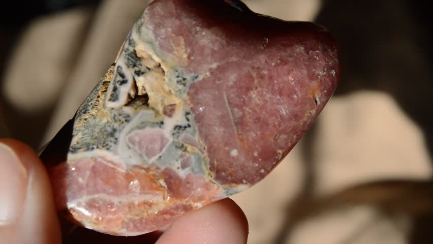 Rhodochrosite mineral gem at sun 