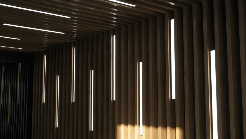 Decorative wooden wall near the edge of an indoor overflow pool. Modern lighting and water reflections create a cozy and relaxing atmosphere in a spa area
