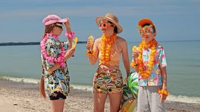 tropical birthday, family party, kids birthday, mom with kids, fun, luau party, tropical beach party, sunset, funny masks, fruit cocktails	 - Powered by Shutterstock - Get 15% off with code: PIKWIZARD15