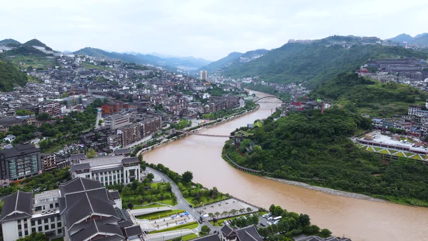 Stunning aerial view of the Chishui River flowing through Maotai Town and Sidu Chishui Scenic Spot in Guizhou, China