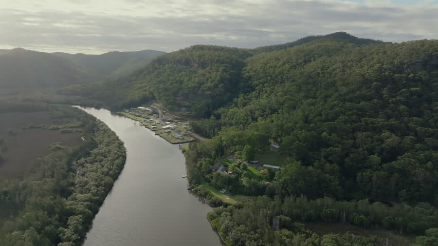 Drone flying past ski gardens along the Hawkesbury river near Wiseman