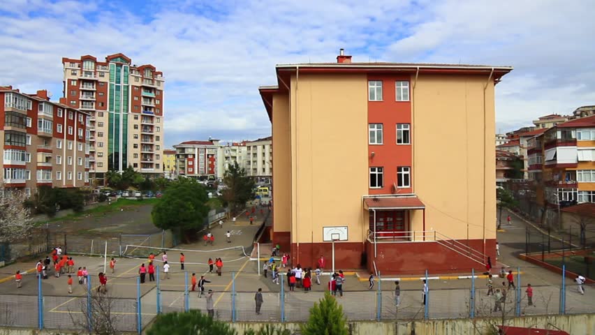 ISTANBUL - MAR 12: Primary school students playing during break time in the yard