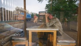 Couple visible by glass door of coffee shop, Lovers drink brew fast as they prepare for their date, Romantic Duo Enjoys Every Sip from Warm Beverage at Cafe, Intimate Pair Wraps Hot latte before exit - Powered by Shutterstock - Get 15% off with code: PIKWIZARD15