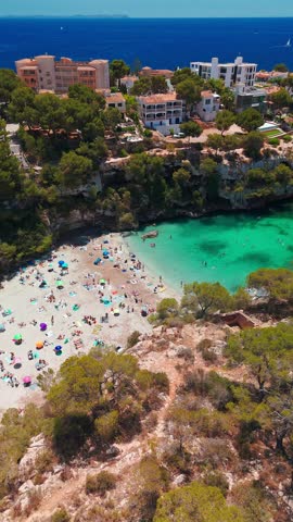 Aerial view of the Bay of Cala Pi in Mallorca, Balearic Islands, Spain. Stunning Mediterranean Sea coast with turquoise water sea bay and white sand beach. Mallorca travel destinations