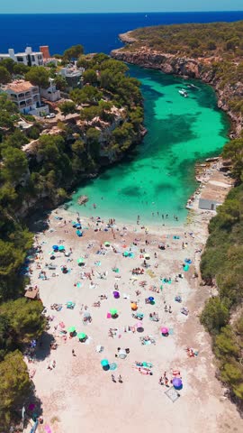 Aerial view of the Bay of Cala Pi in Mallorca, Balearic Islands, Spain. Stunning Mediterranean Sea coast with turquoise water sea bay and white sand beach. Mallorca travel destinations