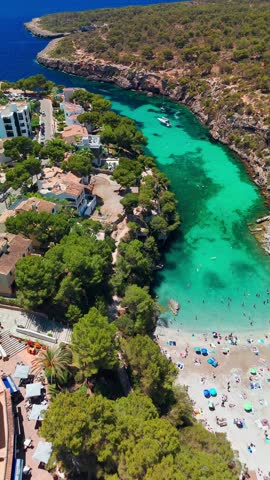Aerial view of the Bay of Cala Pi in Mallorca, Balearic Islands, Spain. Stunning Mediterranean Sea coast with turquoise water sea bay and white sand beach. Mallorca travel destinations
