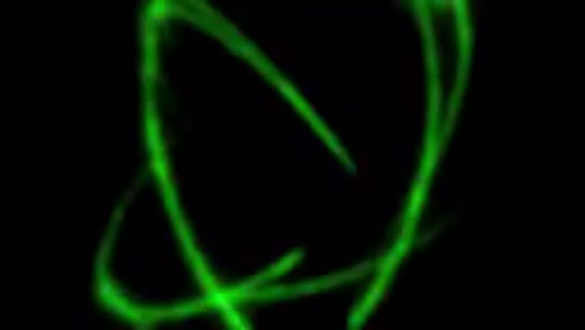 Futuristic Green Energy Logo Intro Animation with Glowing Burst and Sci-Fi Particle Reveal on Dark Background
