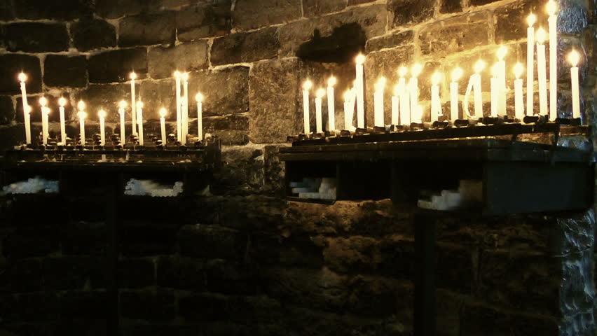 Burning candles in Church of Saint Peter, Portovenere