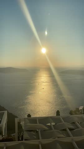 Timelapse of the sunset over the water in santorini greece