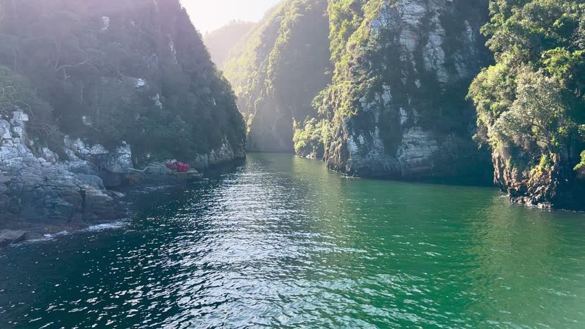 The suspension bridge over the storms river mouth within Tsitsikamma National Park - Eastern Cape in South Africa. It is an important tourist destination along the Garden Route.