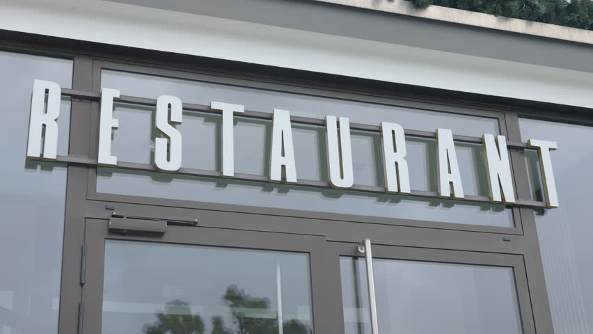 Generic Restaurant sign above door entrance 4k