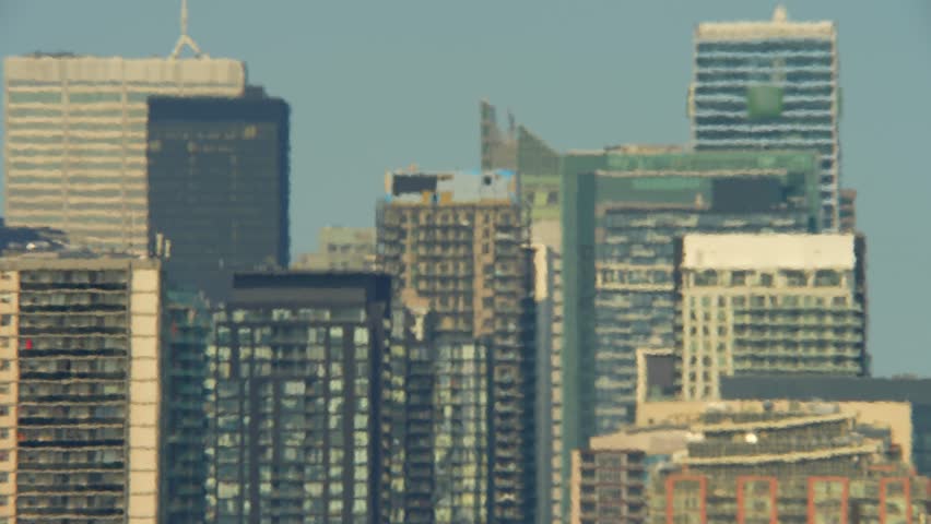View at city in Eastern Canada during climate change, record-breaking heat wave in one of world's hottest cities. Increased respiratory and cardiovascular distress due extreme heat dome.