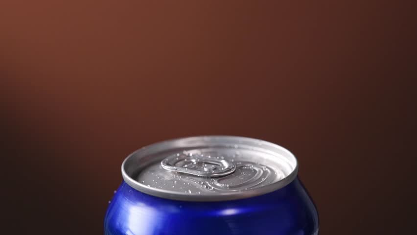 Human hand open aluminum beverage can. Drink in metal jar closeup. Opening soda can