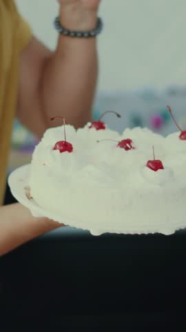 A Truly Delicious and Beautifully Decorated Birthday Cake Featuring Cherries on Top